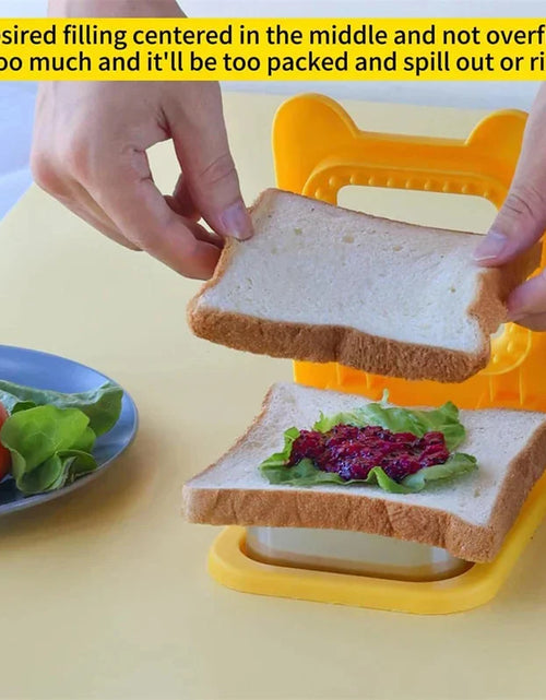 Load image into Gallery viewer, Sandwich Cutter and Sealer Flip Sandwich Cutting Tool for Kids Lunch Stainless Steel Blade Circular Sandwich Bread Toast Mold
