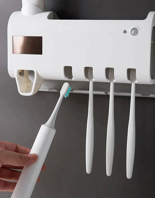 Load image into Gallery viewer, UV Light Sterilizer Toothbrush Holder Cleaner &amp; Automatic Toothpaste Dispenser
